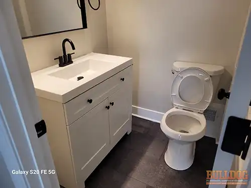 Hall bath after buying a flipped house in South View Manor subdivision of Grandview, MO — 64030 (38.90212940N, 94.49951420W)