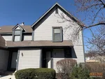 home-inspector-4964-w-60th-terr-mission-ks-66205-20260309_140208 Exterior of 40-year-old vacant two-story townhome in Roland Court subdivision of Mission, KS — 66205