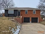 Exterior of 55-year-old raised ranch in Heather Heights subdivision of Kansas City, KS 66102