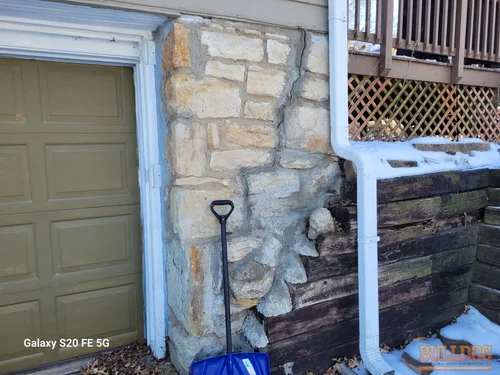 Patched and cracked stone foundation repair in Morningside subdivision of Kansas City, MO – 64110 - January 28, 2026