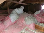 Polyfill attic insulation in 70-year-old ranch in Terrace Lake Gardens subdivision of Kansas City, MO — 64137