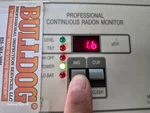 radon-testing-34509-e-303rd-st-garden-city-mo-64747-20260328_121858 Low radon test result of 1.6 pCi/l at 21-year-old log cabin in Garden City, MO — 64747