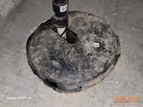 Image of sump pit lid condition in Hazelwood Villas subdivision of Kansas City, KS 66109