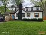 Exterior of 78-year-old 1.5-story home in Friendship Heights subdivision of Kansas City, KS — 66103