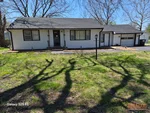 Exterior of 64-year-old ranch-style home in Summit View Addition subdivision of Lee's Summit, MO — 64063