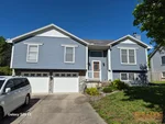 Exterior of 35-year-old split-level home in Bordner Estates North subdivision of Lee's Summit, MO — 64086
