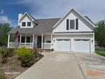 Exterior of 27-year-old 2-story home in Windsor Trace subdivision of Olathe, KS — 66061