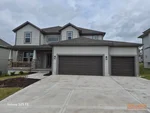 Exterior of new-construction 2-story home in Prairie Farms subdivision of Olathe, KS — 66061