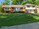 Alt Text:
Exterior of 67-year-old raised ranch in Southwood subdivision of Raytown, MO — 64138