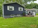 Exterior of 65-year-old raised ranch in Regency Place subdivision of Overland Park, KS — 66212