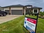 Exterior of 3-year-old reverse ranch home in Falcon Lakes subdivision of Basehor, KS — 66007